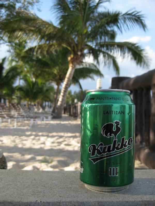 Gluten-free Kukko beer under the palm tree in Thailand - great experience 